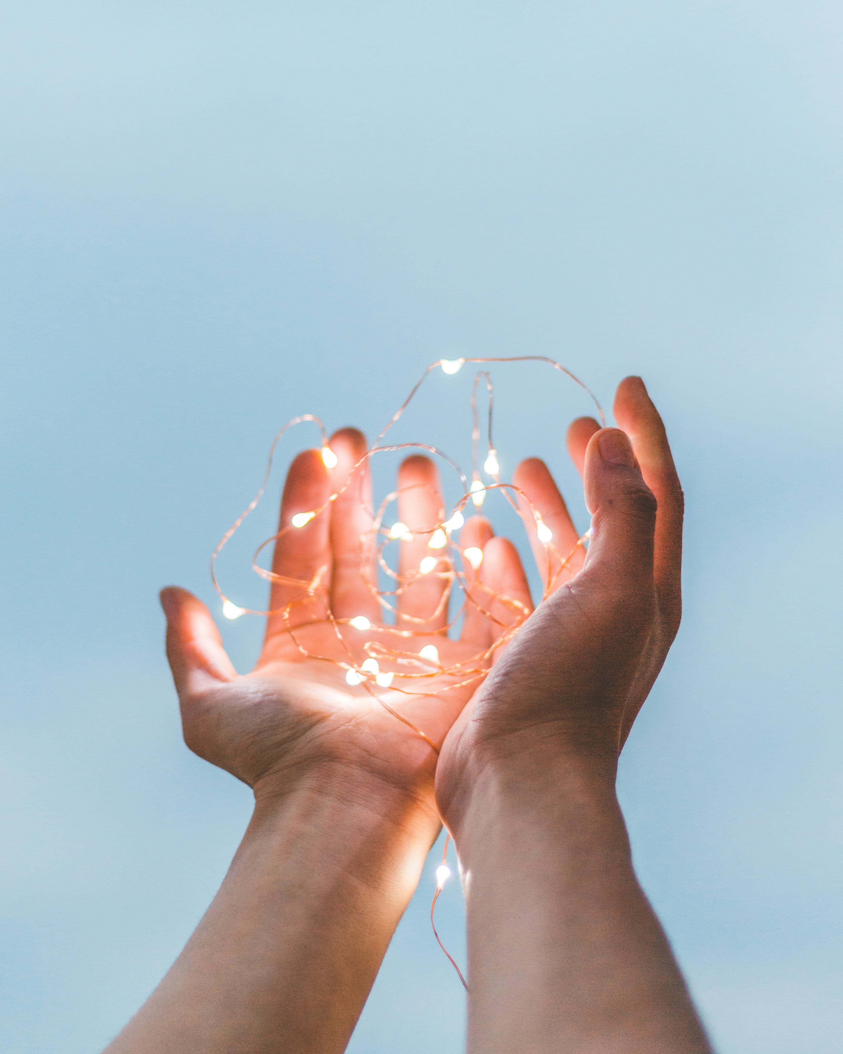 String lights in hands - affordable paper anniversary gifts under $50